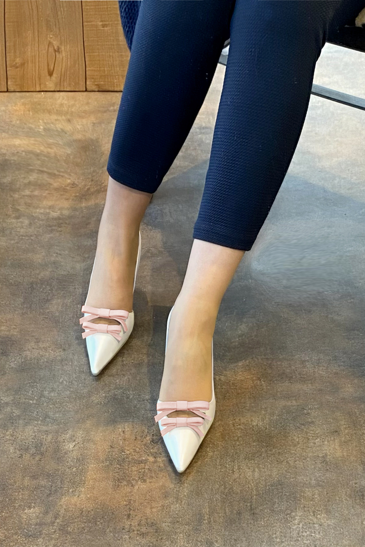 Pure white and powder pink women's open back shoes, with a knot. Pointed toe. High slim heel. Worn view - Florence KOOIJMAN